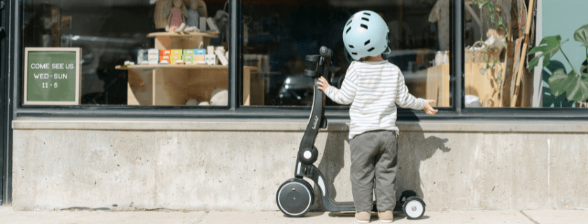 child with scooter